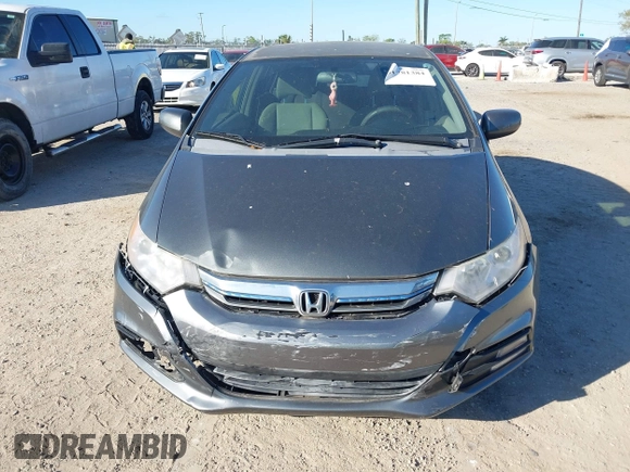 2012 Honda Insight LX with VIN JHMZE2H51CS003694, listed as a IAAI auction lot 41781384 with 154,685 mi miles and . Bid and sale history available at DreamBid. Image 12.