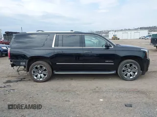 2016 GMC Yukon XL Denali with VIN 1GKS2HKJ8GR139858, listed as a IAAI auction lot 41915183 with 151,830 mi miles. Bid and sale history available at carsss.com. Image 14.