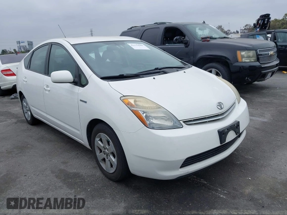 2007 Toyota Prius z VIN JTDKB20UX77550163, wystawiony jako IAAI lot #42379609 z przebiegiem 136 507 mil mil oraz . Historia ofert i sprzedaży dostępna na DreamBid. Obrazek 1.