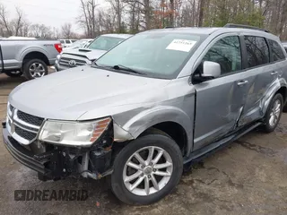 2016 Dodge Journey SXT with VIN 3C4PDCBG4GT122761, listed as a IAAI auction lot 41751265 with 130,304 mi miles. Bid and sale history available at carsss.com. Image 6.