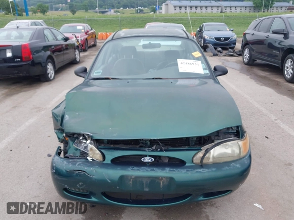 1999 Ford Escort LX z VIN 1FAFP10P1XW230023, wystawiony jako IAAI lot #42486934 z przebiegiem 41 468 mil mil oraz . Historia ofert i sprzedaży dostępna na DreamBid. Obrazek 12.
