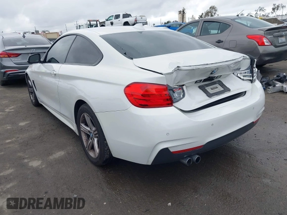 2015 BMW 4 Series 428i with VIN WBA3N7C58FK222925, listed as a IAAI auction lot 41776858 with 106,946 mi miles and . Bid and sale history available at carsss.com. Image 3.