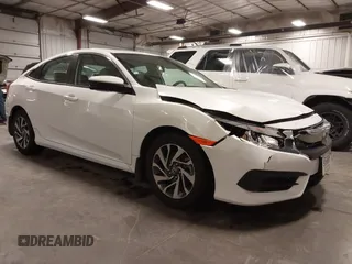 2018 Honda Civic EX with VIN 19XFC2F74JE005647, listed as a IAAI auction lot 41938607 with 90,263 mi miles and . Bid and sale history available at DreamBid. Image 1.