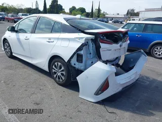 2021 Toyota Prius LE with VIN JTDKAMFP7M3197111, listed as a IAAI auction lot 42031569 with 240,098 mi miles and . Bid and sale history available at DreamBid. Image 3.
