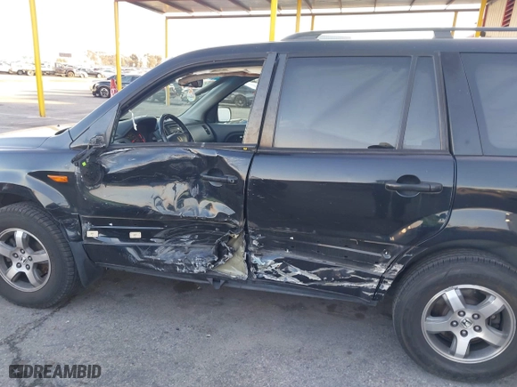 2006 Honda Pilot EX-L with RES with VIN 5FNYF28616B029670, listed as a IAAI auction lot 41425494 with 206,756 mi miles. Bid and sale history available at carsss.com. Image 6.