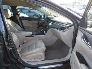 2013 Cadillac XTS with VIN 2G61N5S34D9231315, listed as a IAAI auction lot 41092660 with 206,093 mi miles. Bid and sale history available at carsss.com. Image 5.
