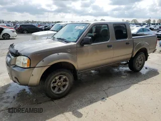 2004 Nissan Frontier XE z VIN 1N6ED27T84C410553, wystawiony jako Copart lot #52327235 z przebiegiem 135 870 mil mil oraz Szkoda całkowita • Salvage title. Historia ofert i sprzedaży dostępna na DreamBid. Obrazek 1.