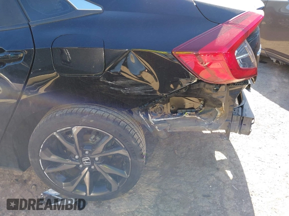 2019 Honda Civic Sport with VIN 19XFC2F80KE033598, listed as a IAAI auction lot 41732698 with 101,664 mi miles and . Bid and sale history available at DreamBid. Image 6.