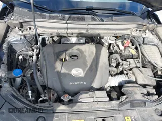 2021 Mazda CX-5 Grand Touring with VIN JM3KFBDM6M1312573, listed as a IAAI auction lot 41936739 with Not Provided miles and . Bid and sale history available at DreamBid. Image 10.