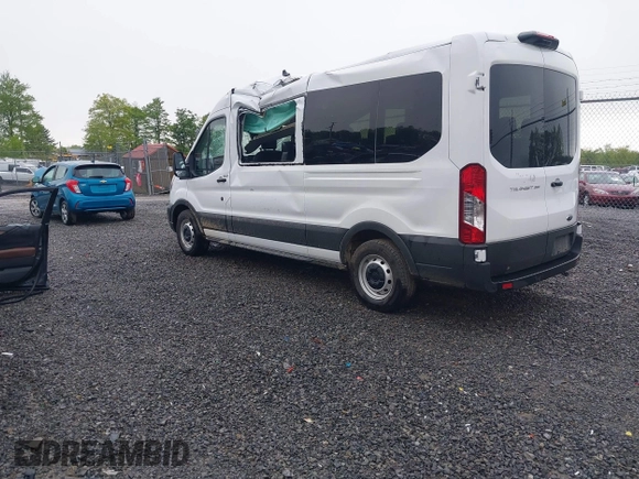 2024 Ford Transit Passenger XL with VIN 1FBAX2C89RKB89363, listed as a IAAI auction lot 42216151 with 1,496 mi miles and . Bid and sale history available at DreamBid. Image 3.