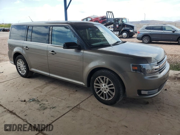 2014 Ford Flex SEL z VIN 2FMGK5C81EBD07735, wystawiony jako Copart lot #54910655 z przebiegiem 197 954 mil mil oraz Szkody całkowita. Historia ofert i sprzedaży dostępna na DreamBid. Obrazek 4.