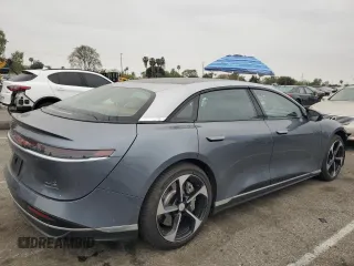 2025 Lucid Air Touring z VIN 50EA1TEA6SA006821, wystawiony jako Copart lot #53298645 z przebiegiem 470 mil mil oraz Szkody całkowita. Historia ofert i sprzedaży dostępna na DreamBid. Obrazek 3.