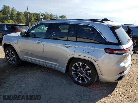 2022 Jeep Grand Cherokee Overland with VIN 1C4RJYD64N8756960, listed as a Copart auction lot 69174624 with 23,249 mi miles and Salvage title. Bid and sale history available at DreamBid. Image 2.