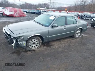 2003 Mercury Grand Marquis LS Premium with VIN 2MEFM75WX3X634344, listed as a IAAI auction lot 41888397 with 129,651 mi miles and . Bid and sale history available at DreamBid. Image 18.