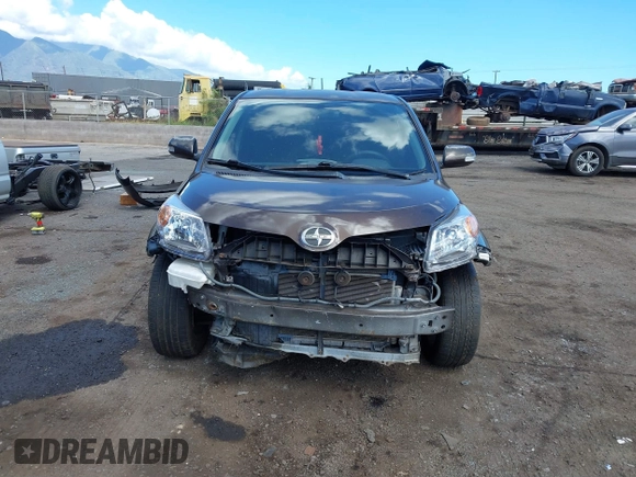 2011 Scion xD with VIN JTKKU4B46B1008873, listed as a IAAI auction lot 41871913 with 145,722 mi miles. Bid and sale history available at carsss.com. Image 6.