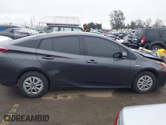 2018 Toyota Prius Two with VIN JTDKBRFUXJ3591956, listed as a IAAI auction lot 41848336 with 62,560 mi miles and . Bid and sale history available at DreamBid. Image 13.