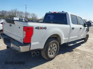 2021 Ford Super Duty F-250 SRW XL with VIN 1FT7W2BT2MEC37128, listed as a IAAI auction lot 41735304 with 103,992 mi miles. Bid and sale history available at carsss.com. Image 4.