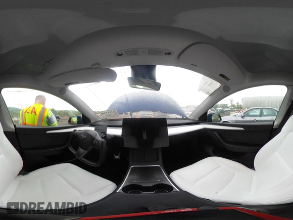 2023 Tesla Model Y Long Range z VIN 7SAYGDEE6PF603981, wystawiony jako IAAI lot #42133348 z przebiegiem 28 566 mil mil oraz . Historia ofert i sprzedaży dostępna na DreamBid. Obrazek 19.