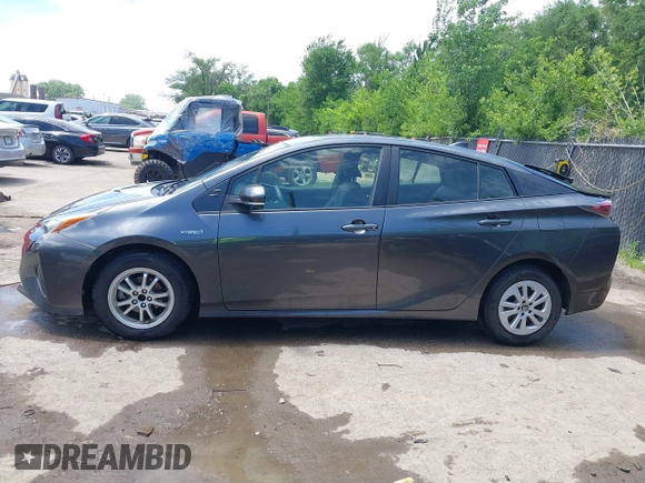 2016 Toyota Prius Two z VIN JTDKBRFU2G3014010, wystawiony jako IAAI lot #42254617 z przebiegiem 171 521 mil mil oraz . Historia ofert i sprzedaży dostępna na DreamBid. Obrazek 14.