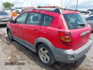 2004 Pontiac Vibe with VIN 5Y2SL62874Z411841, listed as a IAAI auction lot 42502429 with 238,276 mi miles and . Bid and sale history available at DreamBid. Image 3.