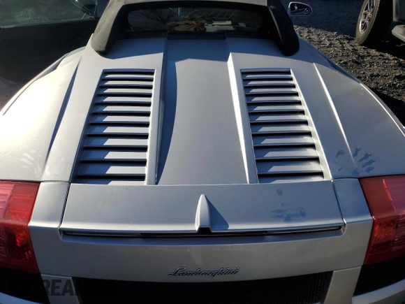 2007 Lamborghini Gallardo z VIN ZHWGU22T57LA05137, wystawiony jako Copart lot #78841294 z przebiegiem 5504 mil mil oraz Szkody całkowita. Historia ofert i sprzedaży dostępna na DreamBid. Obrazek 11.