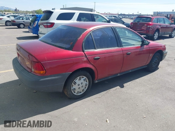 1996 Saturn SL with VIN 1G8ZG5289TZ214790, listed as a IAAI auction lot 42090262 with 197,485 mi miles. Bid and sale history available at carsss.com. Image 4.