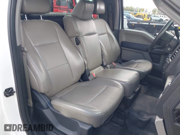 2018 Ford F-150 XL with VIN 1FTMF1CB0JFE21234, listed as a IAAI auction lot 42605399 with 243,035 mi miles and . Bid and sale history available at DreamBid. Image 8.