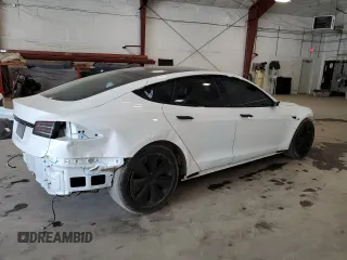 2024 Tesla Model S with VIN 5YJSA1E56RF538488, listed as a Copart auction lot 54702885 with 9,470 mi miles and Salvage title. Bid and sale history available at DreamBid. Image 3.