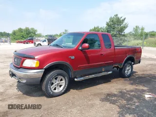 2002 Ford F-150 XL with VIN 1FTRX18L42NA99340, listed as a IAAI auction lot 42641912 with 98,195 mi miles and . Bid and sale history available at DreamBid. Image 2.
