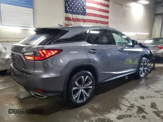 2021 Lexus RX with VIN 2T2HZMDAXMC307489, listed as a Copart auction lot 52098545 with 53,695 mi miles and Salvage Title. Bid and sale history available at carsss.com. Image 3.