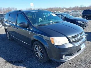 2014 Dodge Grand Caravan SXT with VIN 2C4RDGCG3ER339491, listed as a IAAI auction lot 41744826 with 146,757 mi miles and . Bid and sale history available at DreamBid. Image 1.