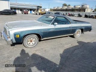 1977 Chevrolet El Camino z VIN 1D80L7R420505, wystawiony jako Copart lot #82137504 z przebiegiem 48 606 mil mil oraz Czysty tytuł • Clean title. Historia ofert i sprzedaży dostępna na DreamBid. Obrazek 1.