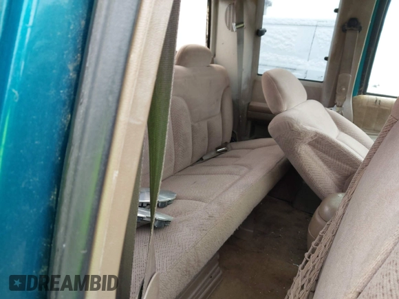 1994 GMC Sierra 1500 with VIN 2GDEK19K2R1549660, listed as a IAAI auction lot 41615642 with 207,399 mi miles and . Bid and sale history available at DreamBid. Image 8.