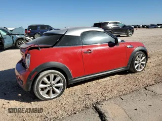 2012 MINI Coupe S z VIN WMWSX3C56CT408371, wystawiony jako Copart lot #73730514 z przebiegiem 95 786 mil mil oraz Szkody całkowita. Historia ofert i sprzedaży dostępna na DreamBid. Obrazek 3.