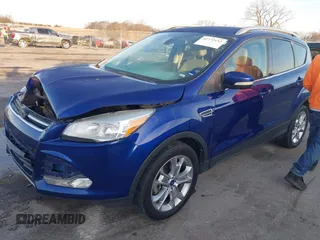 2014 Ford Escape Titanium with VIN 1FMCU9JX4EUD30964, listed as a IAAI auction lot 41772153 with 179,481 mi miles and . Bid and sale history available at DreamBid. Image 17.