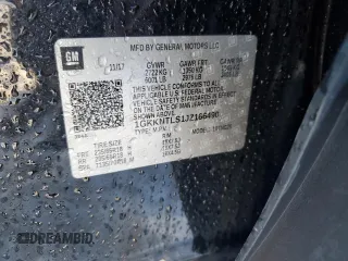 2018 GMC Acadia SLE z VIN 1GKKNTLS1JZ166490, wystawiony jako Copart lot #47698745 z przebiegiem 95 299 mil mil oraz Szkoda całkowita • Salvage title. Historia ofert i sprzedaży dostępna na DreamBid. Obrazek 16.