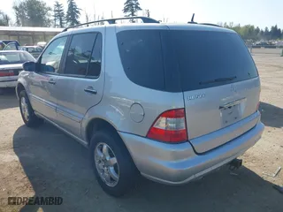 2002 Mercedes-Benz M-Class with VIN 4JGAB75E22A364537, listed as a IAAI auction lot 42119184 with 222,372 mi miles. Bid and sale history available at carsss.com. Image 3.