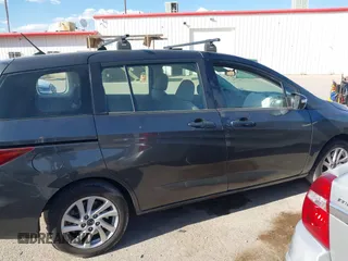 2013 Mazda 5 Sport with VIN JM1CW2BL4D0145725, listed as a IAAI auction lot 42190177 with 143,209 mi miles and . Bid and sale history available at DreamBid. Image 13.