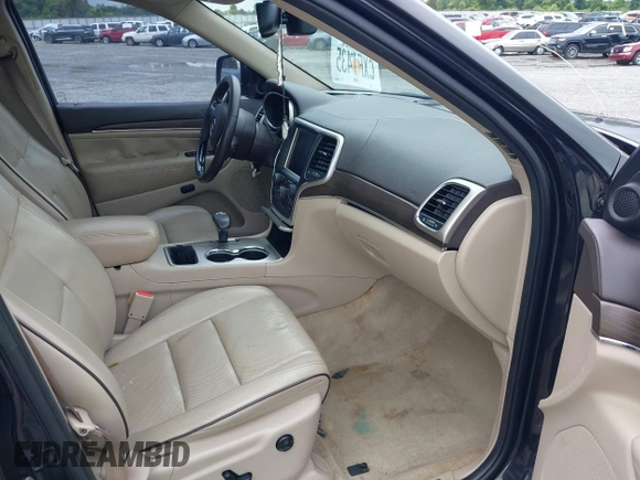 2015 Jeep Grand Cherokee Overland with VIN 1C4RJECG3FC152601, listed as a IAAI auction lot 42414340 with 139,315 mi miles and . Bid and sale history available at DreamBid. Image 5.
