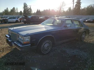 1984 Cadillac Seville z VIN 1G6AS6987EE810927, wystawiony jako Copart lot #42836105 z przebiegiem 19 894 mil mil oraz Tytuł czysty. Historia ofert i sprzedaży dostępna na DreamBid. Obrazek 1.
