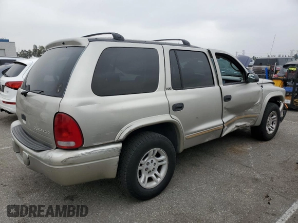 2002 Dodge Durango with VIN 1B4HR48N82F100912, listed as a Copart auction lot 58509495 with 195,039 mi miles and Salvage title. Bid and sale history available at DreamBid. Image 3.