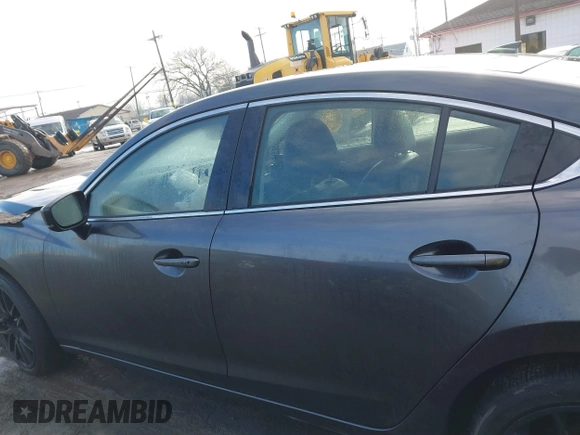 2020 Mazda 6 Grand Touring with VIN JM1GL1TY0L1521859, listed as a IAAI auction lot 41634368 with 36,709 mi miles and . Bid and sale history available at DreamBid. Image 14.