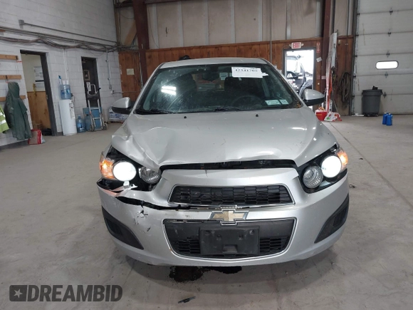 2016 Chevrolet Sonic LT z VIN 1G1JC6SG9G4151259, wystawiony jako IAAI lot #42341705 z przebiegiem 131 981 mil mil oraz . Historia ofert i sprzedaży dostępna na DreamBid. Obrazek 6.