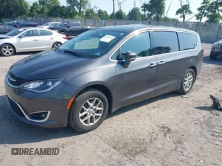 2020 Chrysler Pacifica Touring with VIN 2C4RC1FG6LR120775, listed as a IAAI auction lot 42562876 with 119,853 mi miles and . Bid and sale history available at DreamBid. Image 2.