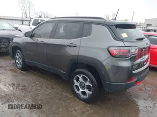 2022 Jeep Compass Trailhawk with VIN 3C4NJDDBXNT206118, listed as a IAAI auction lot 41945077 with 7,785 mi miles and . Bid and sale history available at DreamBid. Image 3.