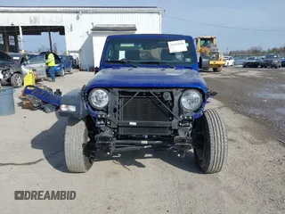 2020 Jeep Wrangler Unlimited Sport S z VIN 1C4HJXDG2LW260238, wystawiony jako IAAI lot #41415820 z przebiegiem 62 224 mil mil oraz . Historia ofert i sprzedaży dostępna na DreamBid. Obrazek 13.