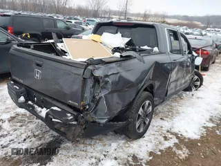 2019 Honda Ridgeline RTL z VIN 5FPYK3F57KB021943, wystawiony jako IAAI lot #41189250 z przebiegiem 36 444 mil mil oraz . Historia ofert i sprzedaży dostępna na DreamBid. Obrazek 4.