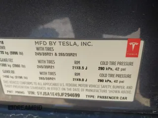 2018 Tesla Model S 75D with VIN 5YJSA1E49JF294699, listed as a IAAI auction lot 41567770 with 34,644 mi miles and . Bid and sale history available at DreamBid. Image 9.