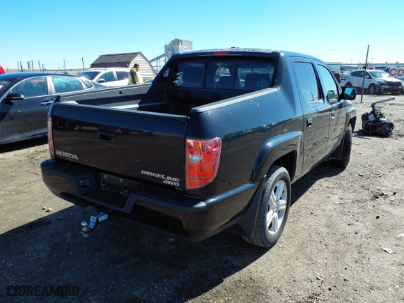 2011 Honda Ridgeline RTL with VIN 5FPYK1F53BB008207, listed as a IAAI auction lot 41745089 with 160,170 mi miles. Bid and sale history available at carsss.com. Image 4.