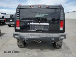 2005 Hummer H2 SUV with VIN 5GRGN23UX5H115383, listed as a Copart auction lot 71682984 with 157,405 mi miles and Salvage Title. Bid and sale history available at carsss.com. Image 6.